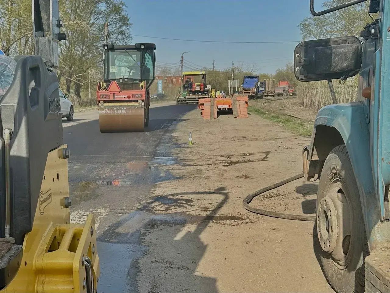 Уплотнение покрытия дорожным катком